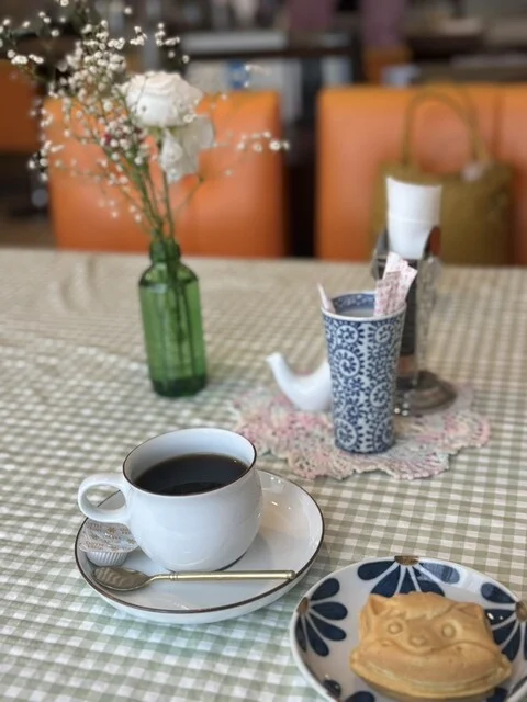 おいしいパンとコーヒー。本好きな人もおすすめです。 : ぶどうの木の写真